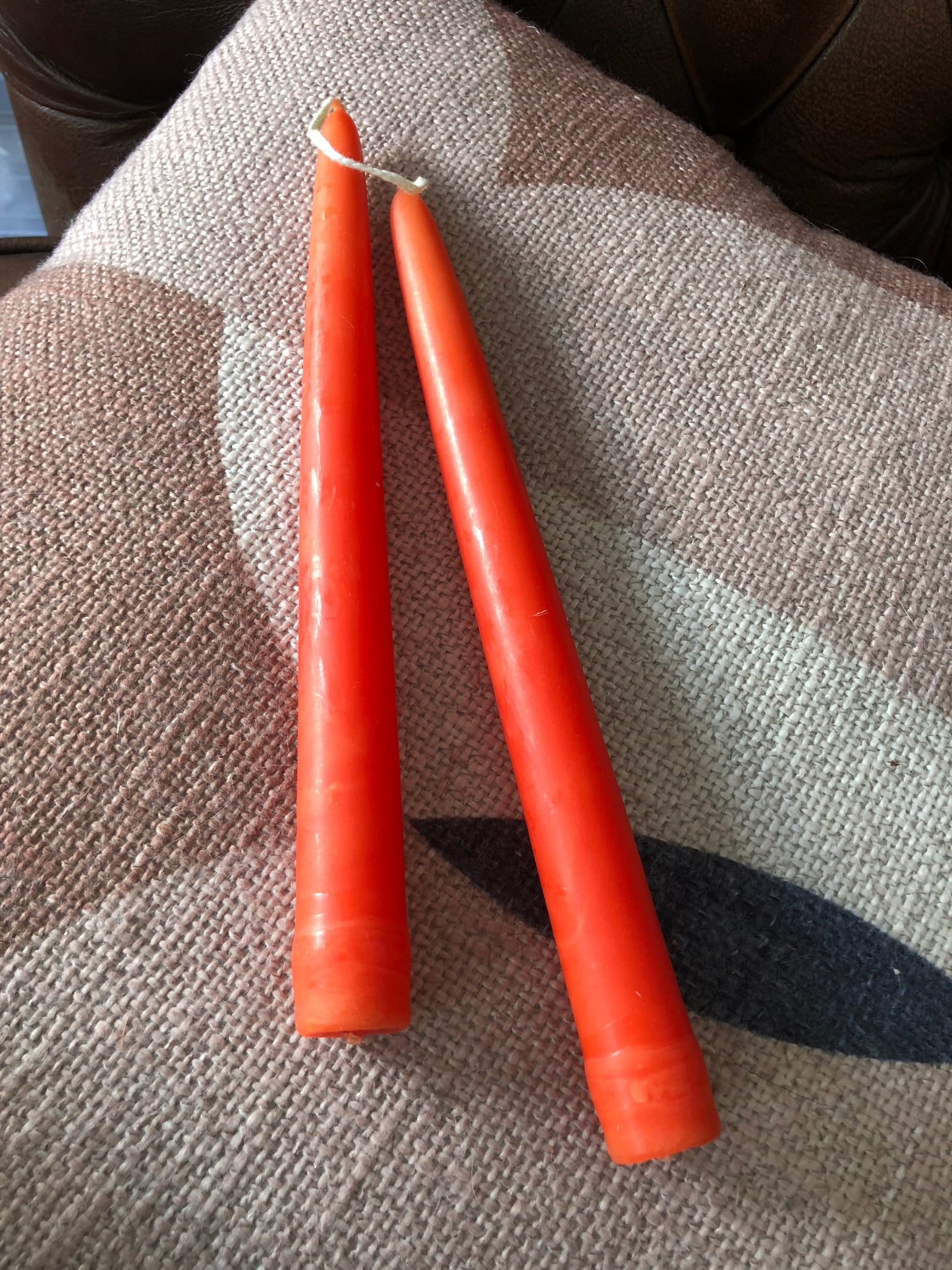 Pair of Orange Dinner Candles.