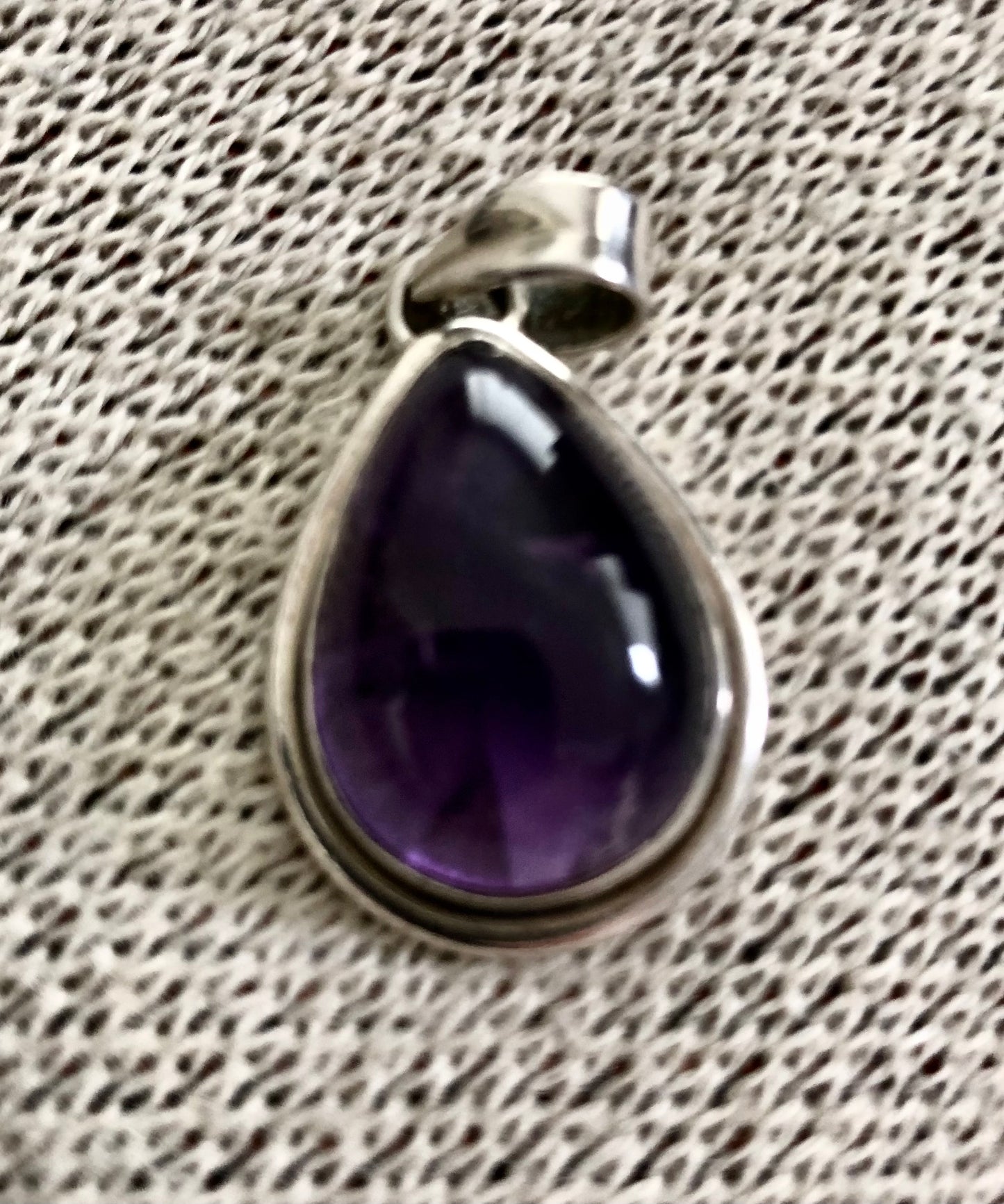 Amethyst and Silver Teardrop Pendant.