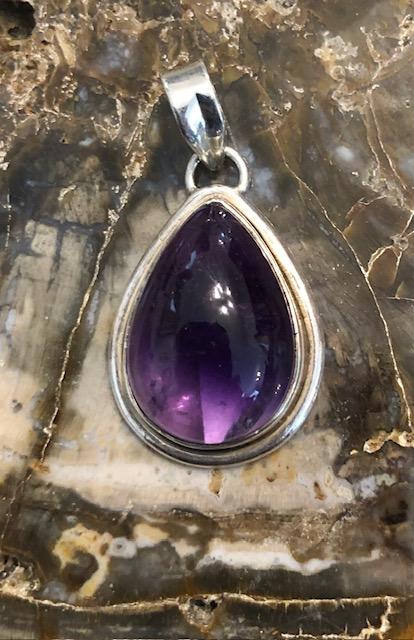Amethyst and Silver Teardrop Pendant.