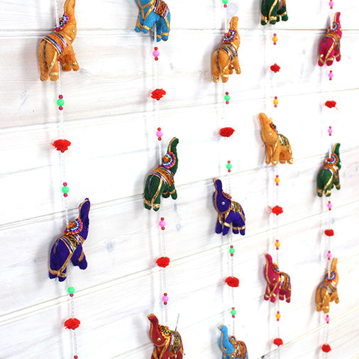 String of multi-coloured elephants.