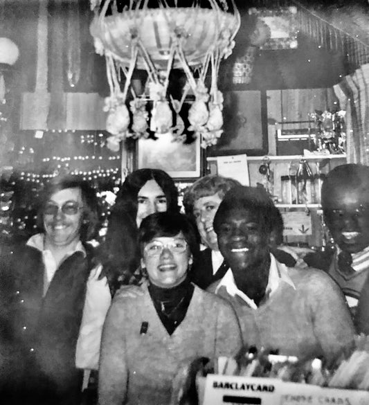Early staff members and friends at Court Arcade