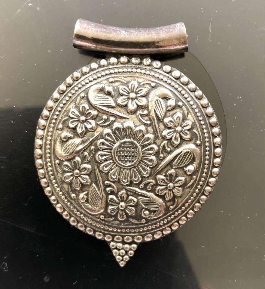 Round Engraved Silver Pendant.