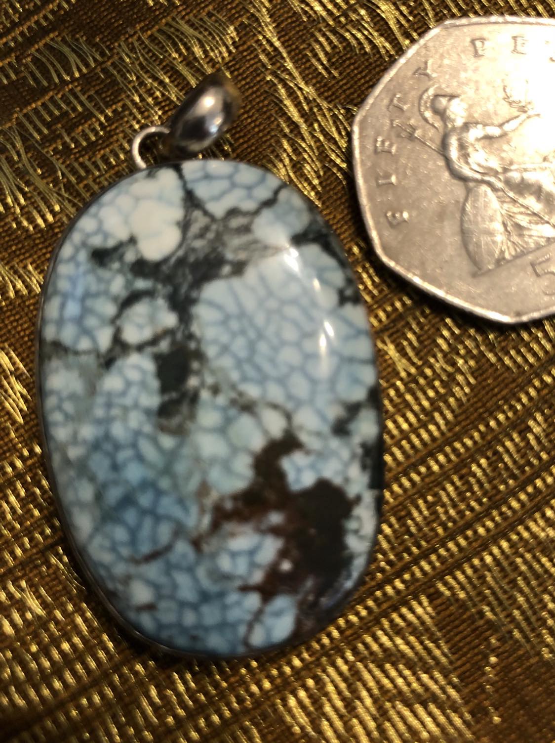 Turquoise and Silver Pendant.