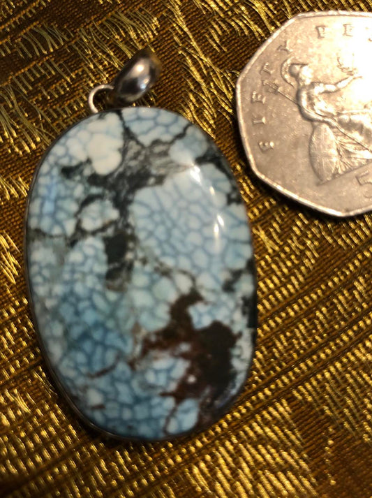 Turquoise and Silver Pendant.