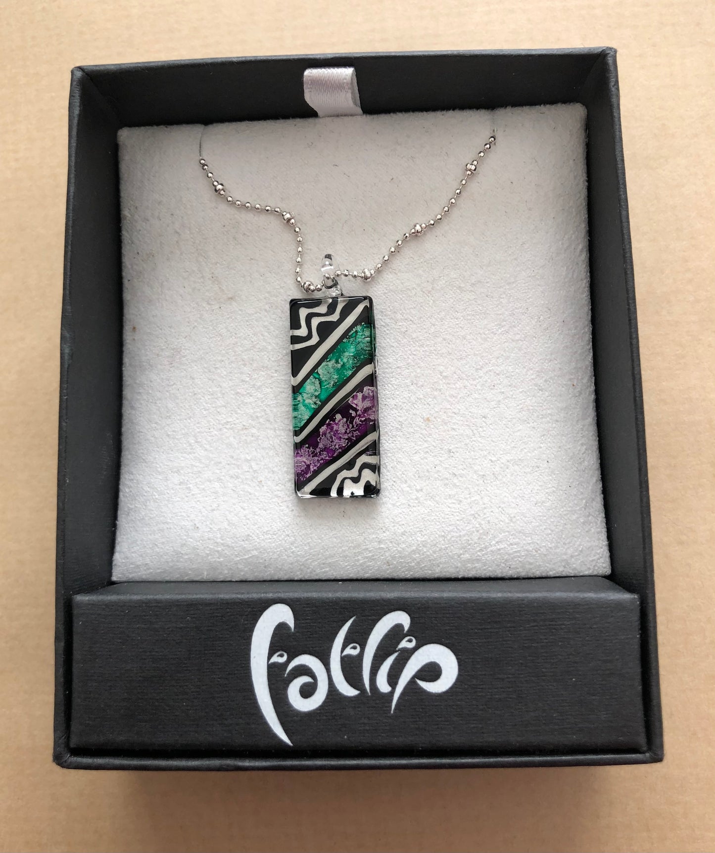 Geometric glass pendant from Fatlip.