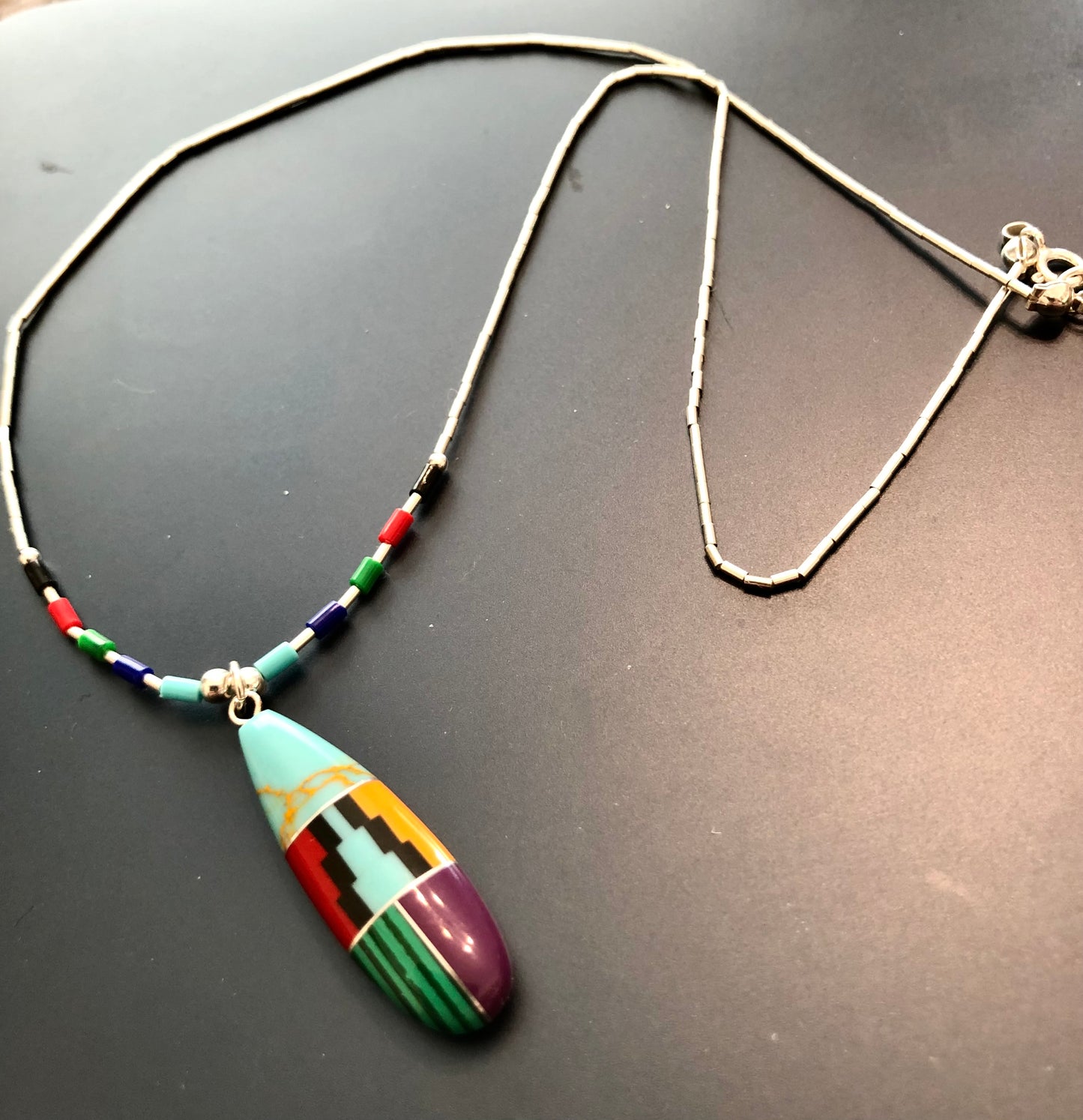 Aztec Pendant (on a 16-inch liquid silver chain).