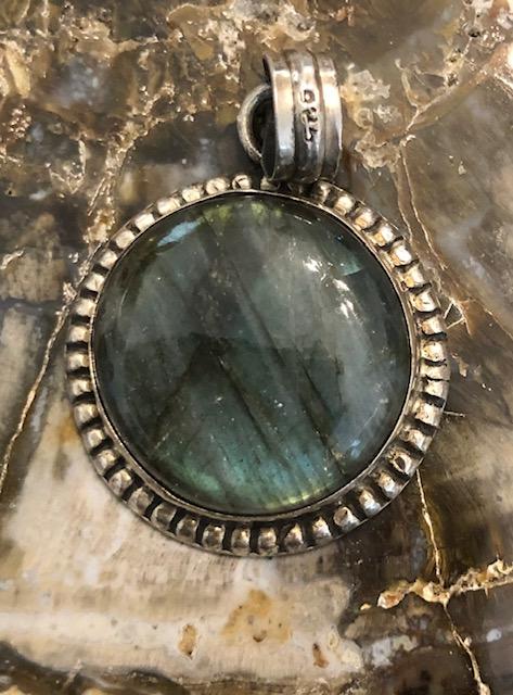 Labradorite and Aged Silver circular pendant.